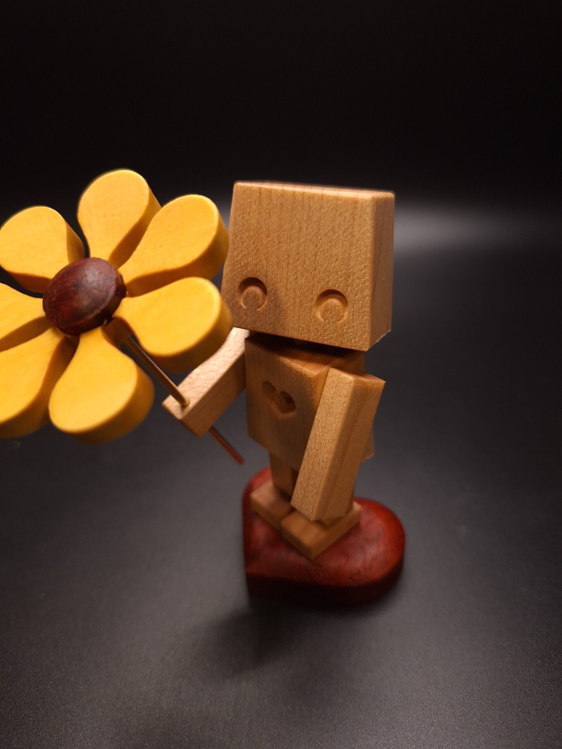 Flower Child (little robot holding a flower)